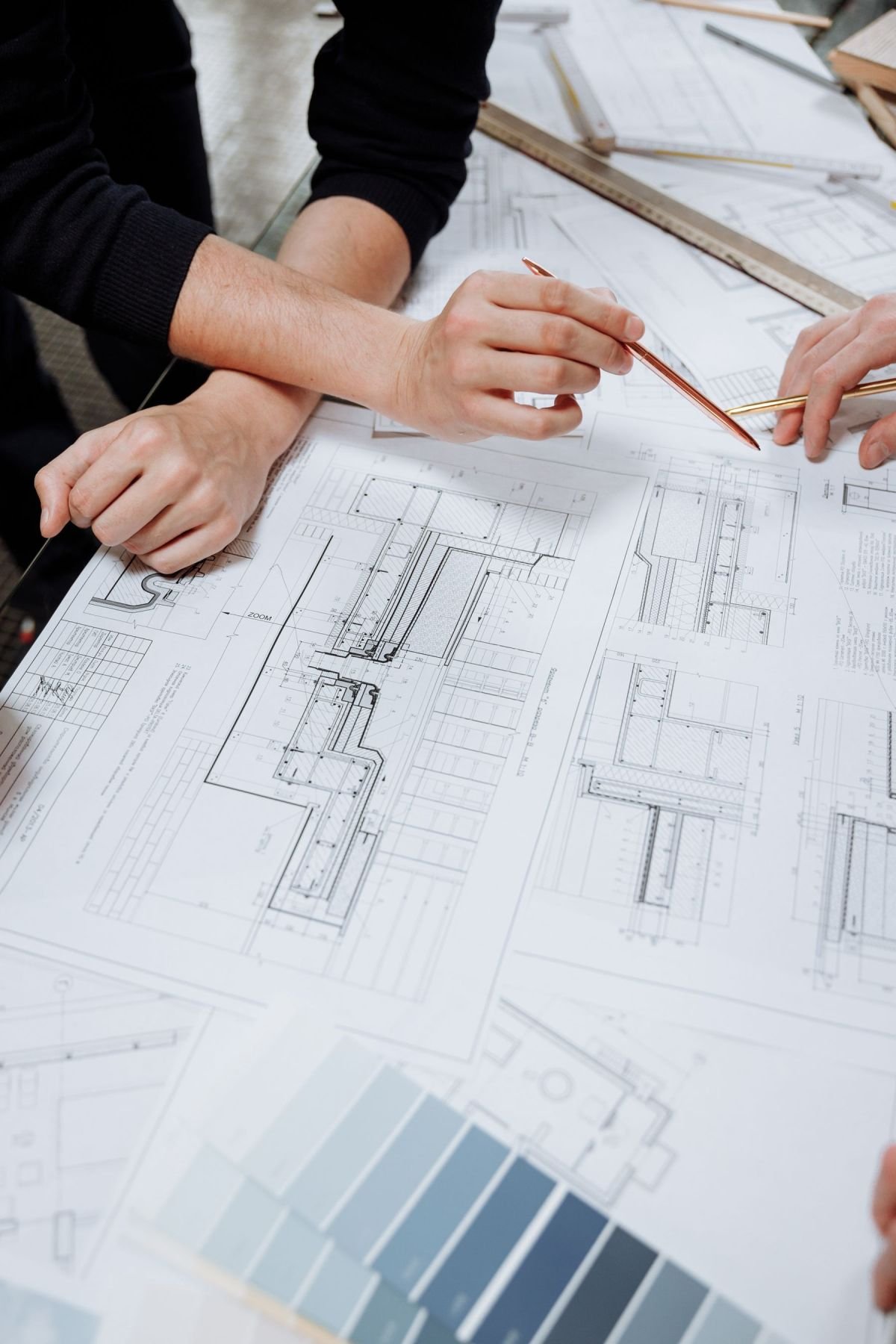Architects reviewing blueprints